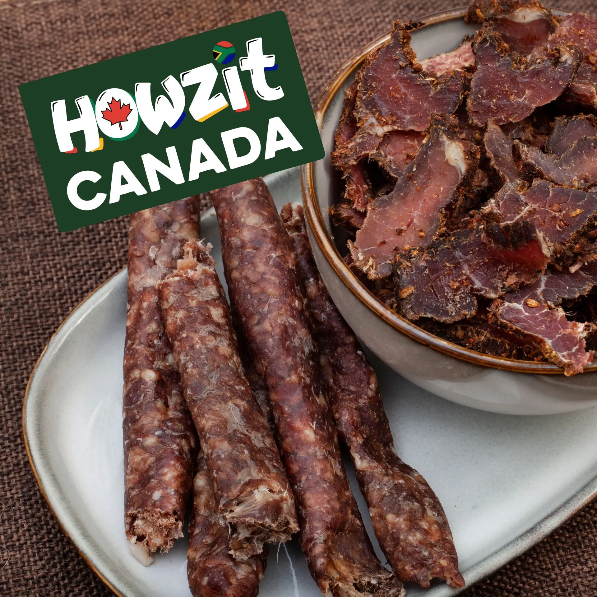 Plate of authentic South African biltong and droëwors with Howzit Canada logo
