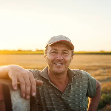 Farmer-smiling-tractor-reduced